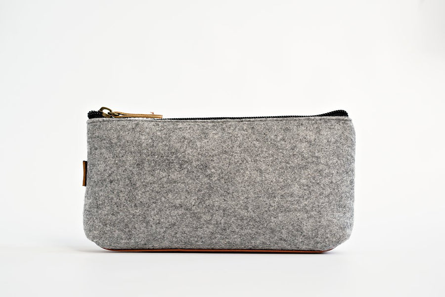 A premium quality environmentally-friendly felt supply pouch to keep it all together.